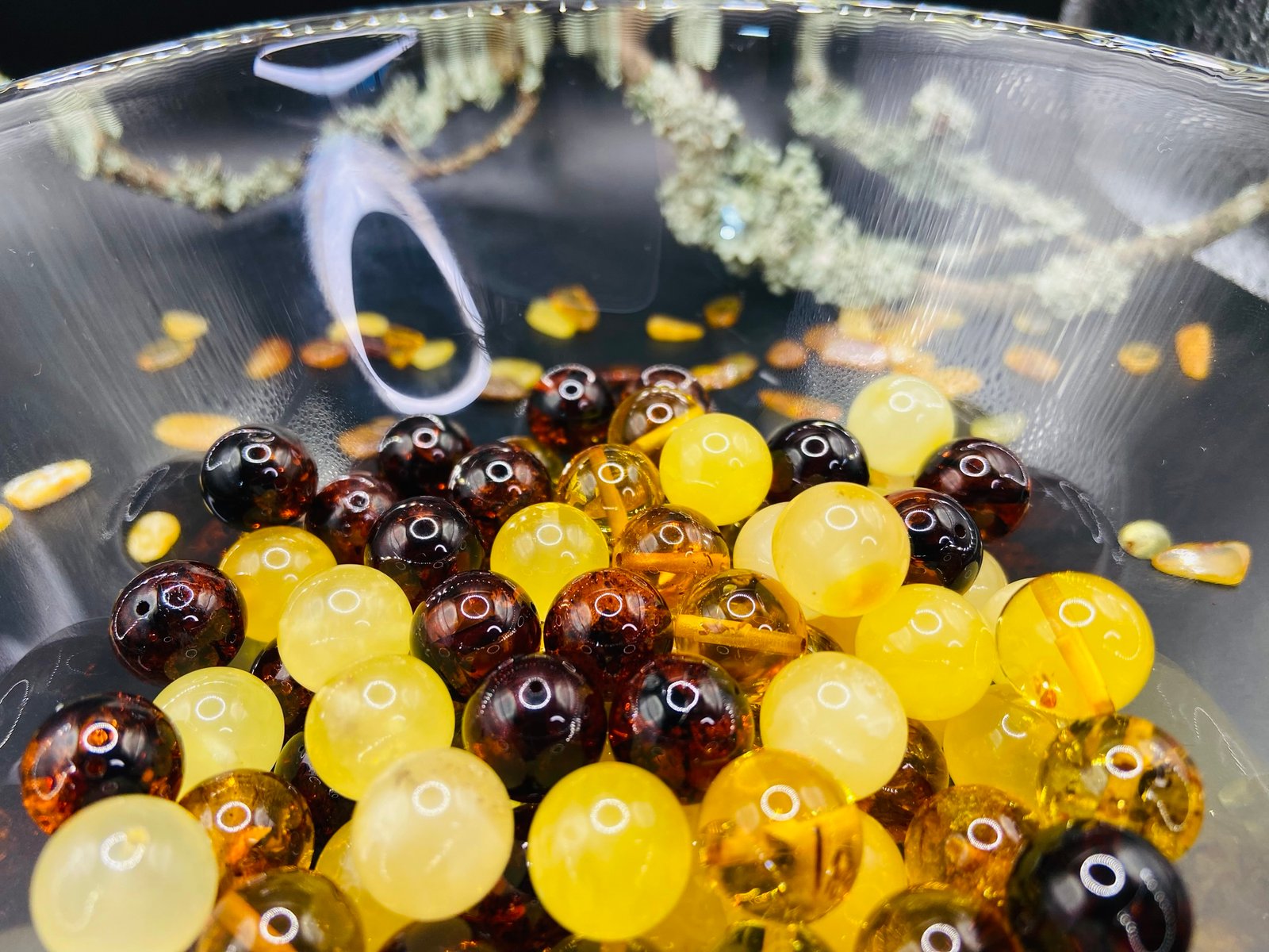 Baltic Amber bead lot in a transparent bowl