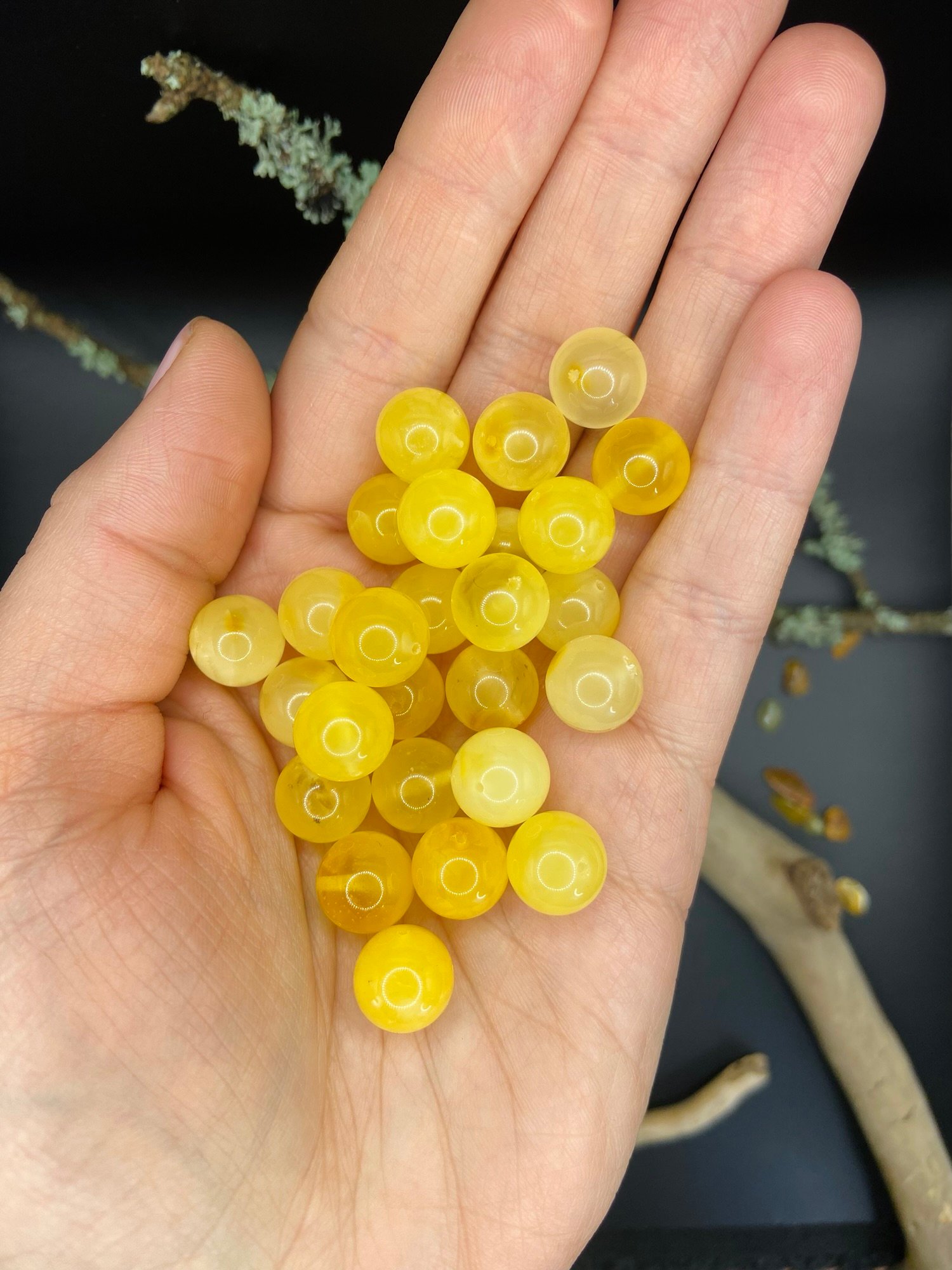 11 mm round beads in woman’s hands