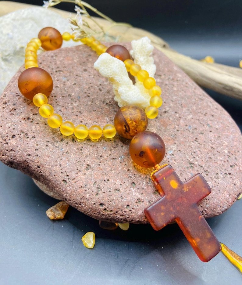 56548094-r-il-04d8b2-6803850001-il_794xN.6803850001_rshw Premium Anglikāņu rožukronis no Dabiska Baltijas Dzintara