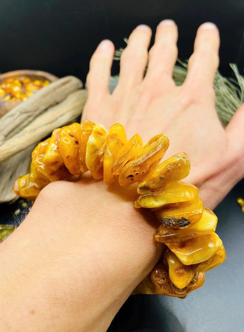 56548094-r-il-075688-7268186418-il_794xN.7268186418_jjto Dabiska Dzintara lielizmēra šķelto gabalu rokassprādze