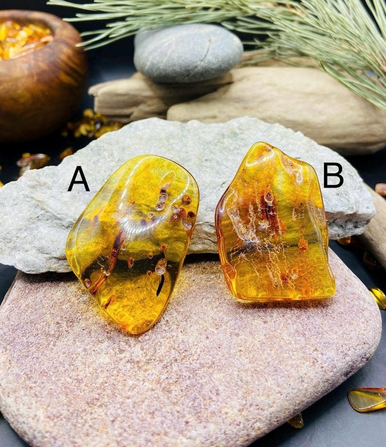 56548094-r-il-07f538-7266775545-il_794xN.7266775545_ahem Pulēti stikla tipa Dzintara akmeņi, katrs 7 grami smags