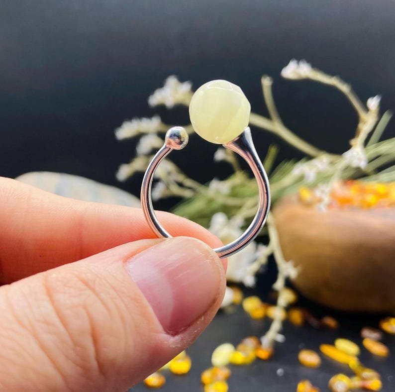 Fasēta Dzintara gredzens ar sudrabu, pašregulējošs