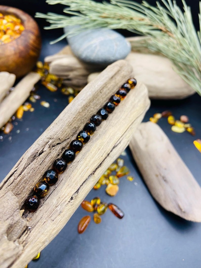 56548094-r-il-331a47-7173897054-il_794xN.7173897054_d4kc 6mm Daudzšķautņainas krāsu mainošās Dzintara pērlītes