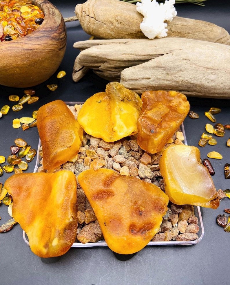 56548094-r-il-353804-6878789588-il_794xN.6878789588_7o9h Baltijas Dzintara Mistērijas Akmeņi 10-15 grami