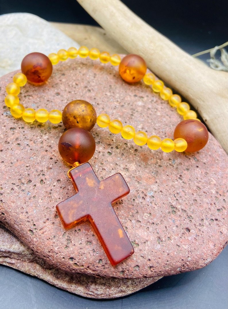 56548094-r-il-5ac3e0-6803947361-il_794xN.6803947361_p9mz Premium Anglikāņu rožukronis no Dabiska Baltijas Dzintara