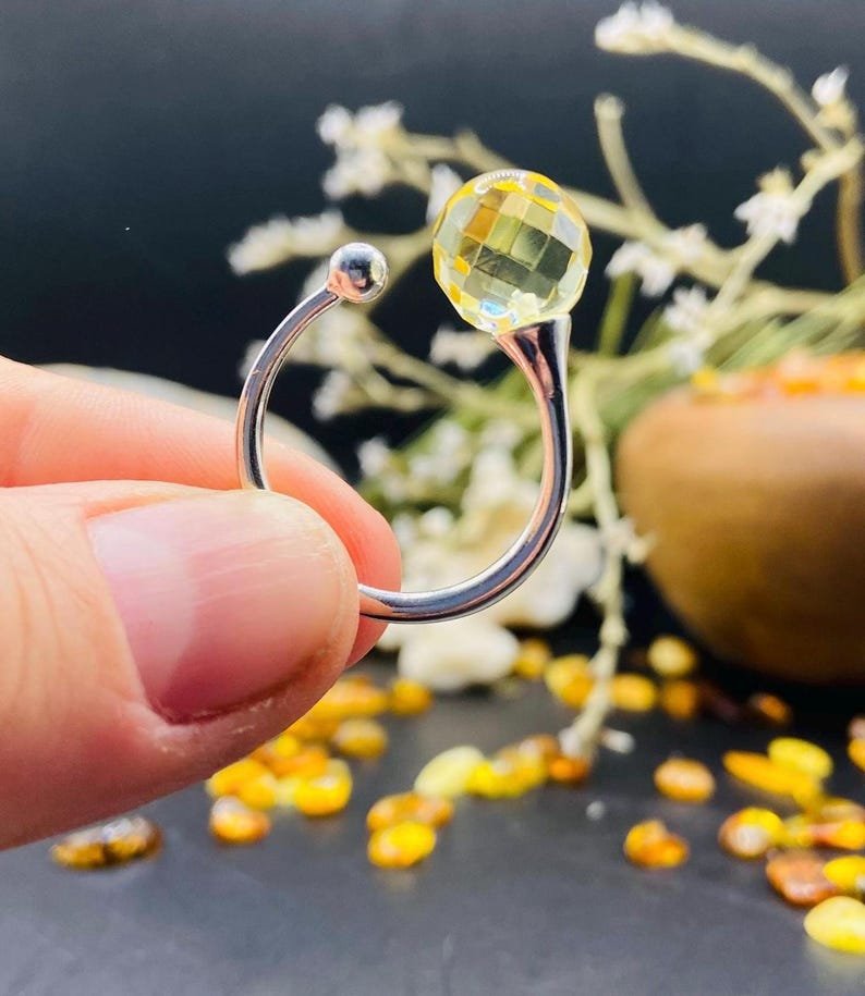 Fasēta Dzintara gredzens ar sudrabu, pašregulējošs