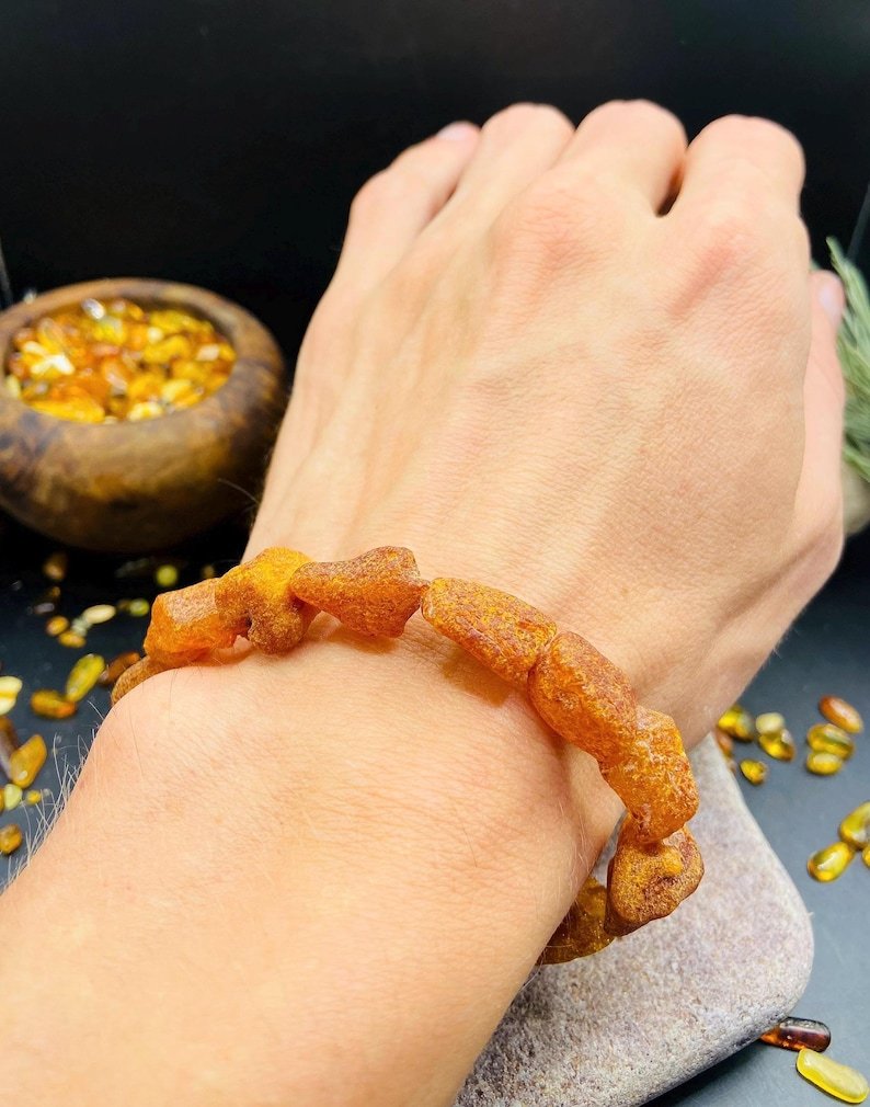 56548094-r-il-a2687a-7164414390-il_794xN.7164414390_3y8t Neapstrādāta konjaka krāsa, škelto gabalu Baltijas Dzintara aproce