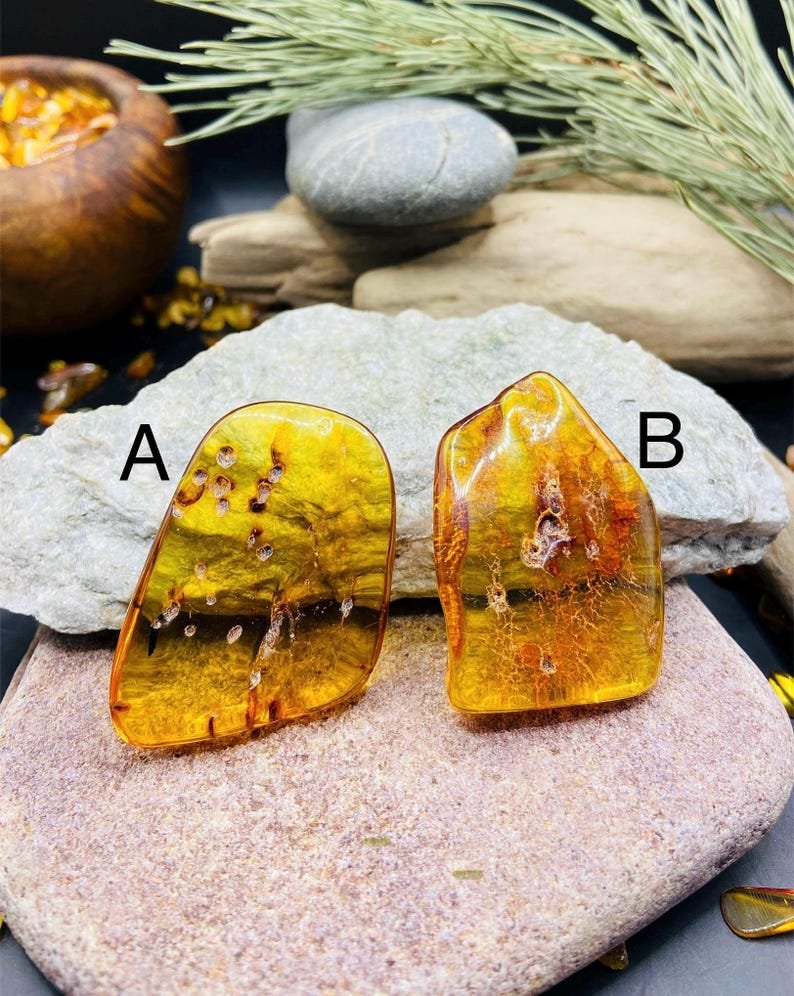 56548094-r-il-b954cc-7266775109-il_794xN.7266775109_oen5 Pulēti stikla tipa Dzintara akmeņi, katrs 7 grami smags