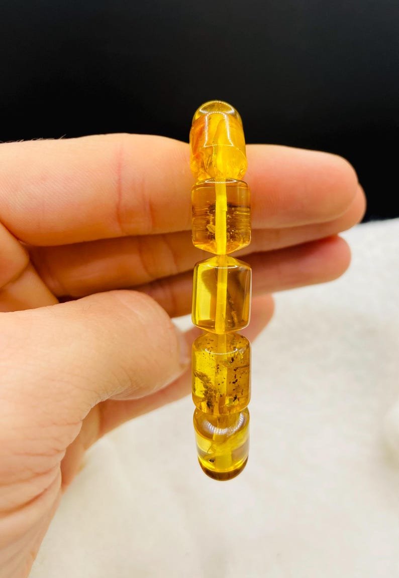 56548094-r-il-00e387-7378417531-il_794xN.7378417531_qqsb Caurspīdīga citrona krāsas ekskluzīva Dzintara aproce