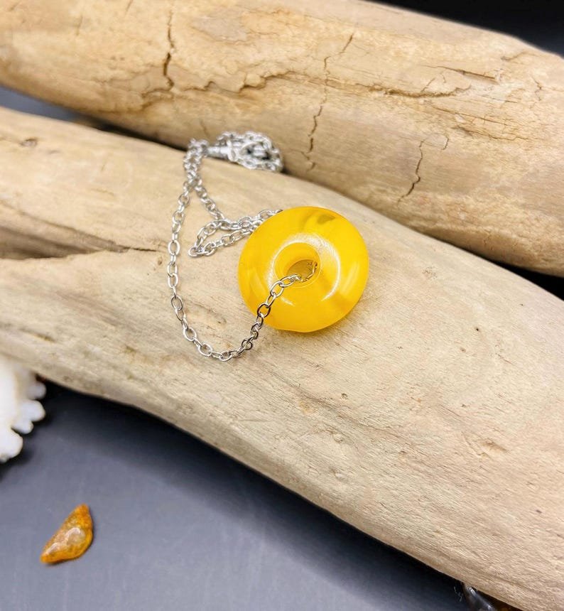 56548094-r-il-060c5f-6862172520-il_794xN.6862172520_682e Izsmalcināts Dzintara dzeltens virtulis ar nerūsējošā tērauda ķēdīti