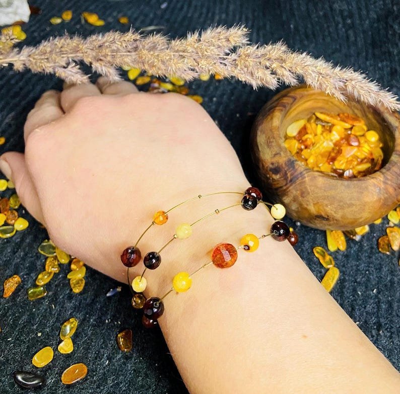 56548094-r-il-17d7f0-6817264507-il_794xN.6817264507_9wdg Baltijas Dzintara trīs stiepļu aproces un kaklarotas komplekts