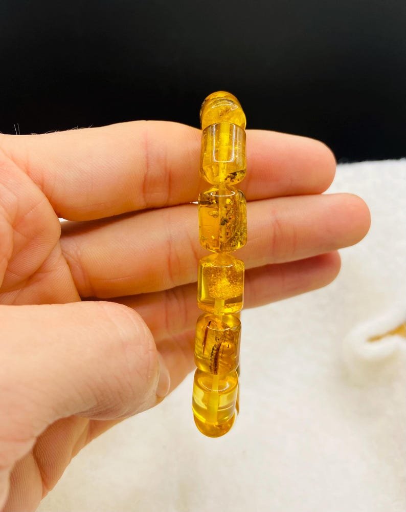 56548094-r-il-1c193f-7378417337-il_794xN.7378417337_ni48 Caurspīdīga citrona krāsas ekskluzīva Dzintara aproce