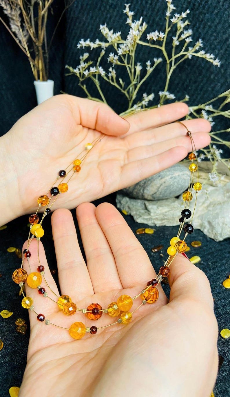 56548094-r-il-269923-6619268689-il_794xN.6619268689_eukd Baltijas Dzintara trīs stiepļu aproces un kaklarotas komplekts