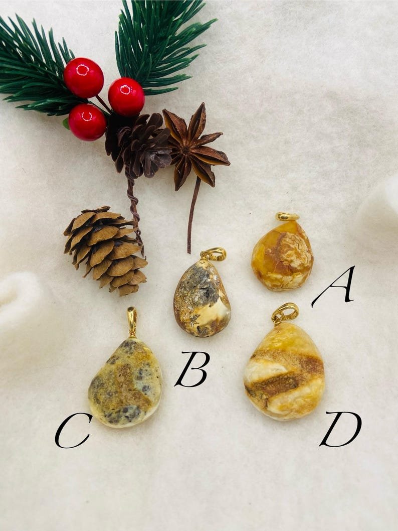 Premium klases neapstrādāti gaišās krāsas Dzintara kuloni