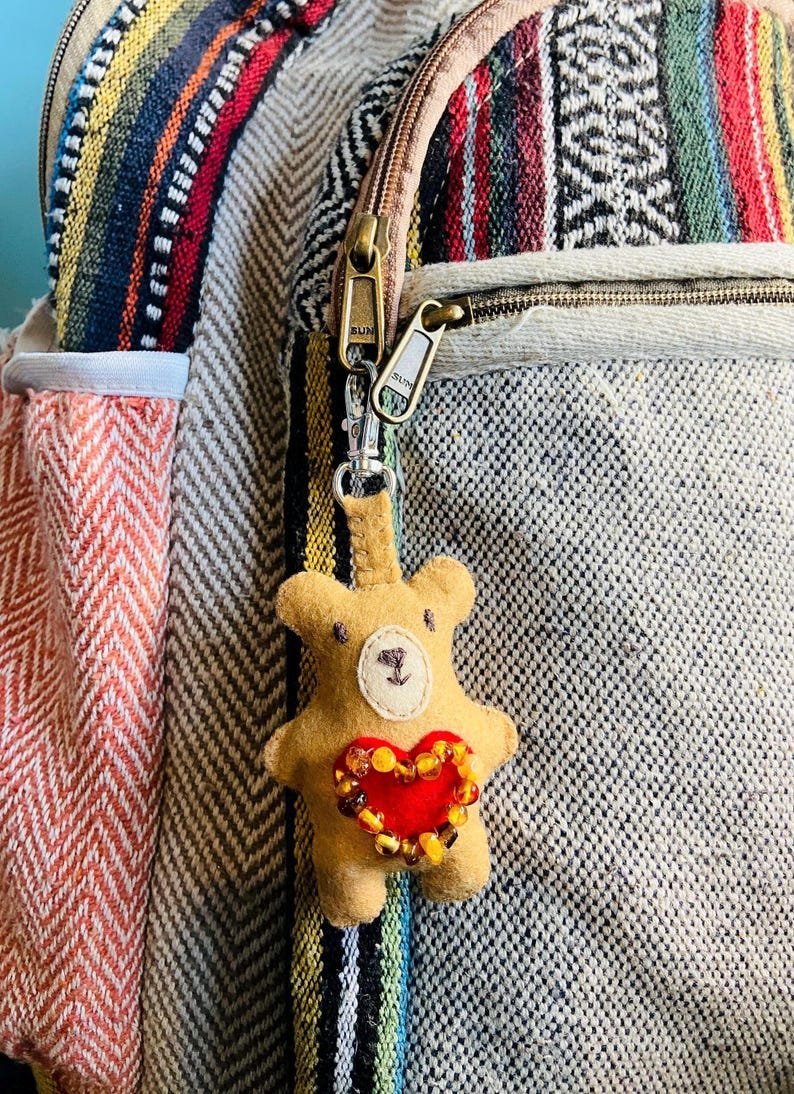 56548094-r-il-388ca3-7385331841-il_794xN.7385331841_660a Roku šūti krāsainie lāči bērniem - filca audums un Dzintara pērlītes