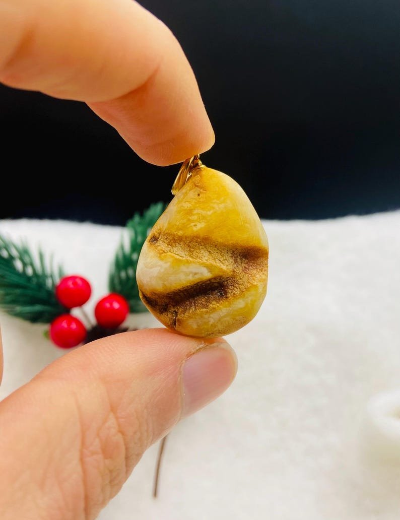 Premium klases neapstrādāti gaišās krāsas Dzintara kuloni