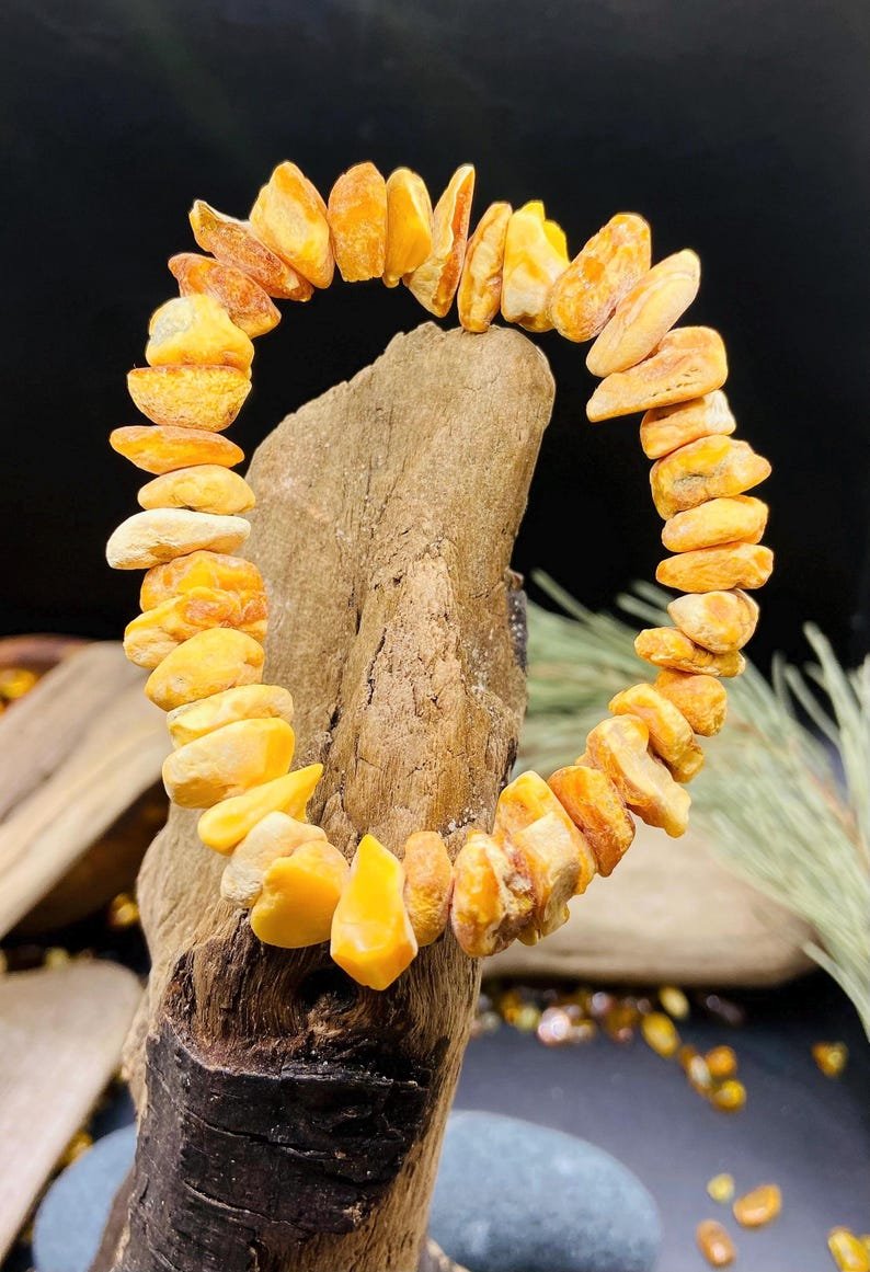 56548094-r-il-3ecdee-7325397815-il_794xN.7325397815_56gh Unikāla Baltā Dzintara šķelto gabalu aproce