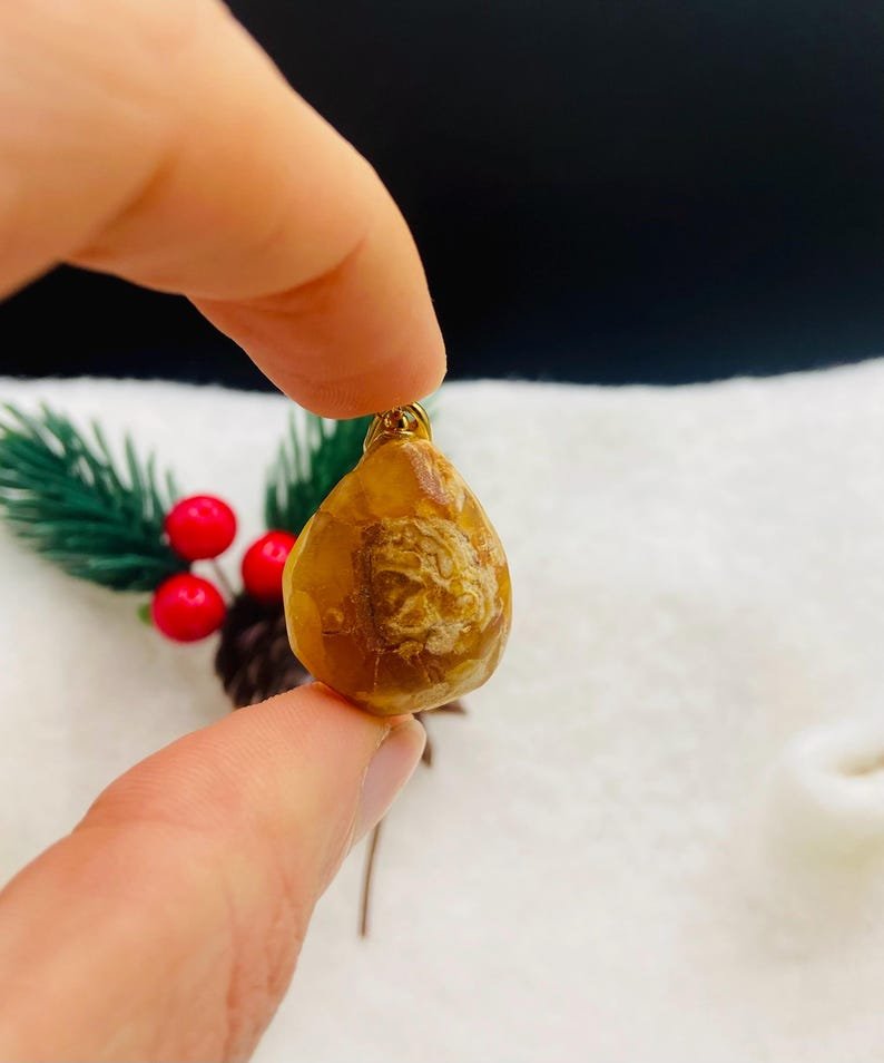 Premium klases neapstrādāti gaišās krāsas Dzintara kuloni