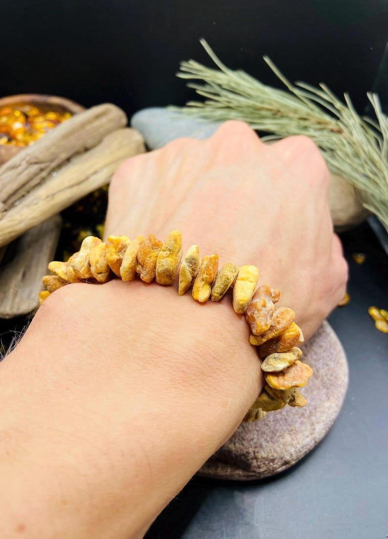 56548094-r-il-460f24-7325396159-il_794xN.7325396159_saj5 Unikāla Baltā Dzintara šķelto gabalu aproce