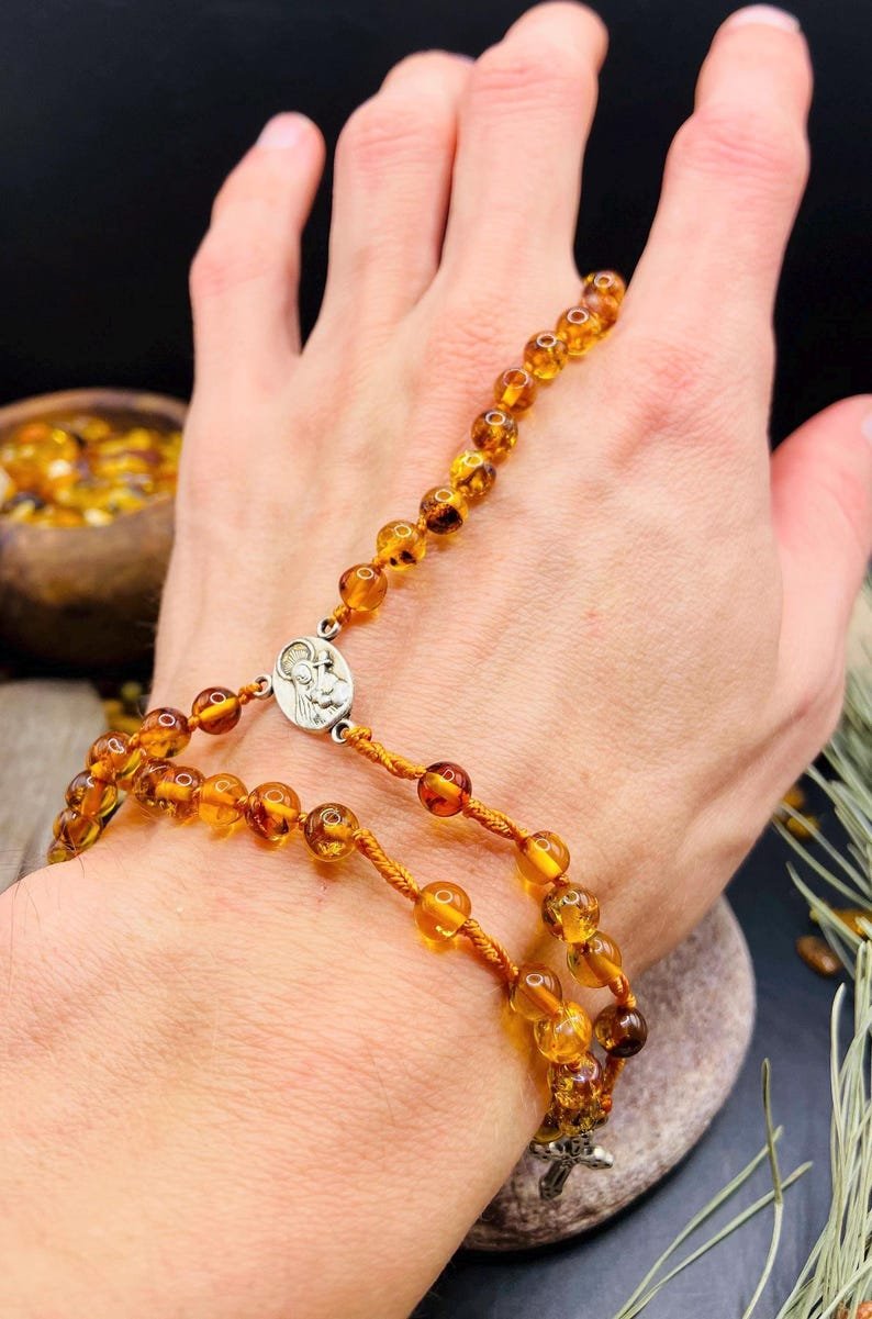 56548094-r-il-5ed184-7298506335-il_794xN.7298506335_gj45 Burvīgs Dzintara rožukronis ar 59 pērlītēm