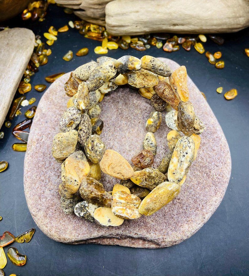 56548094-r-il-63beab-7283155856-il_794xN.7283155856_kqzg Nepulēta Purva Dzintara aproce ar mežonīguma pieskaņu