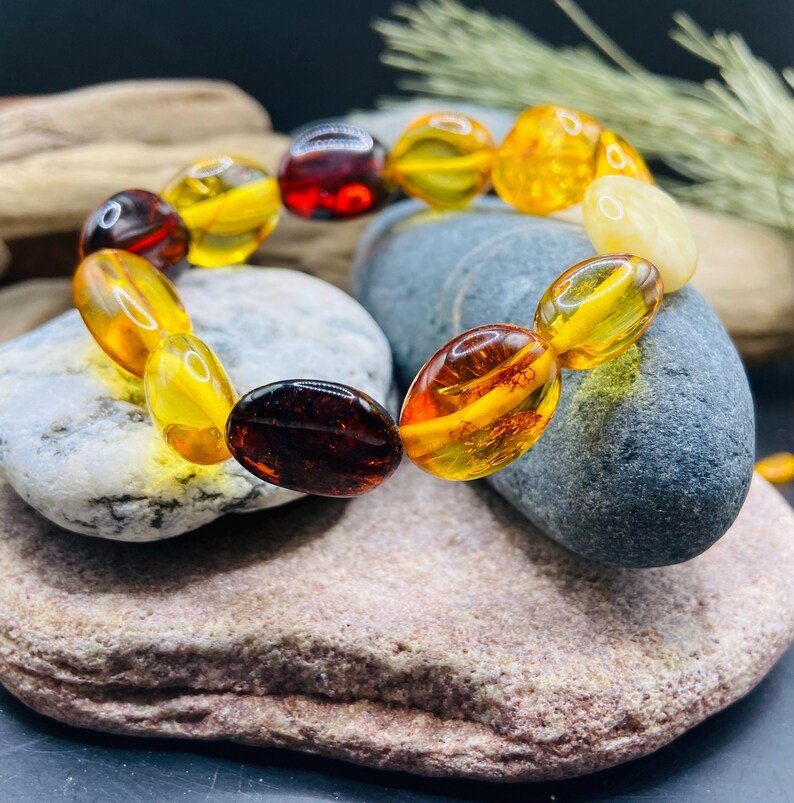 56548094-r-il-63c982-7274117604-il_794xN.7274117604_9tla Koša un neatkārtojama Baltijas Dzintara "flatback" pērlīšu aproce