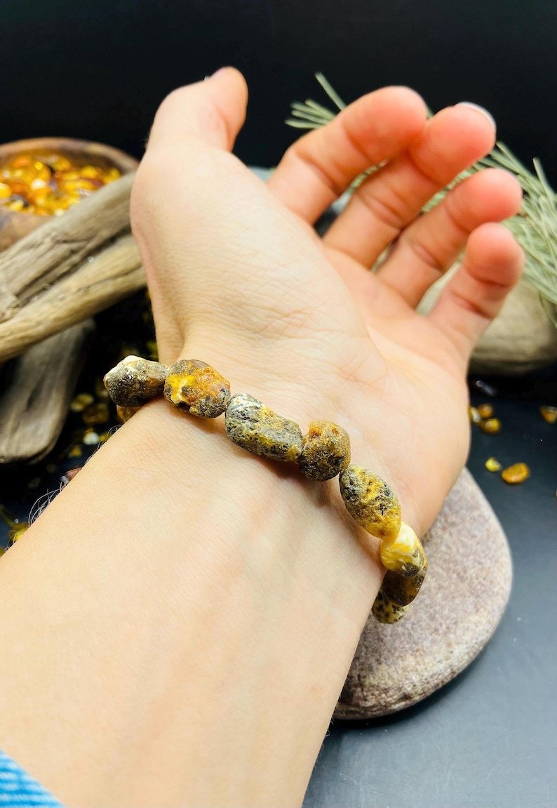 56548094-r-il-673596-7331088755-il_794xN.7331088755_jk38 Nepulēta Purva Dzintara aproce ar mežonīguma pieskaņu