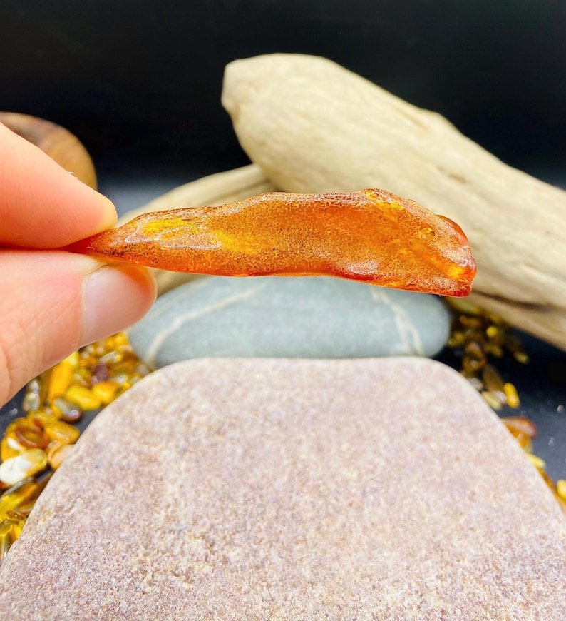 56548094-r-il-7286ee-7344277084-il_794xN.7344277084_f8u4 Garš Dzintara gabaliņš spilgtā konjaka krāsā