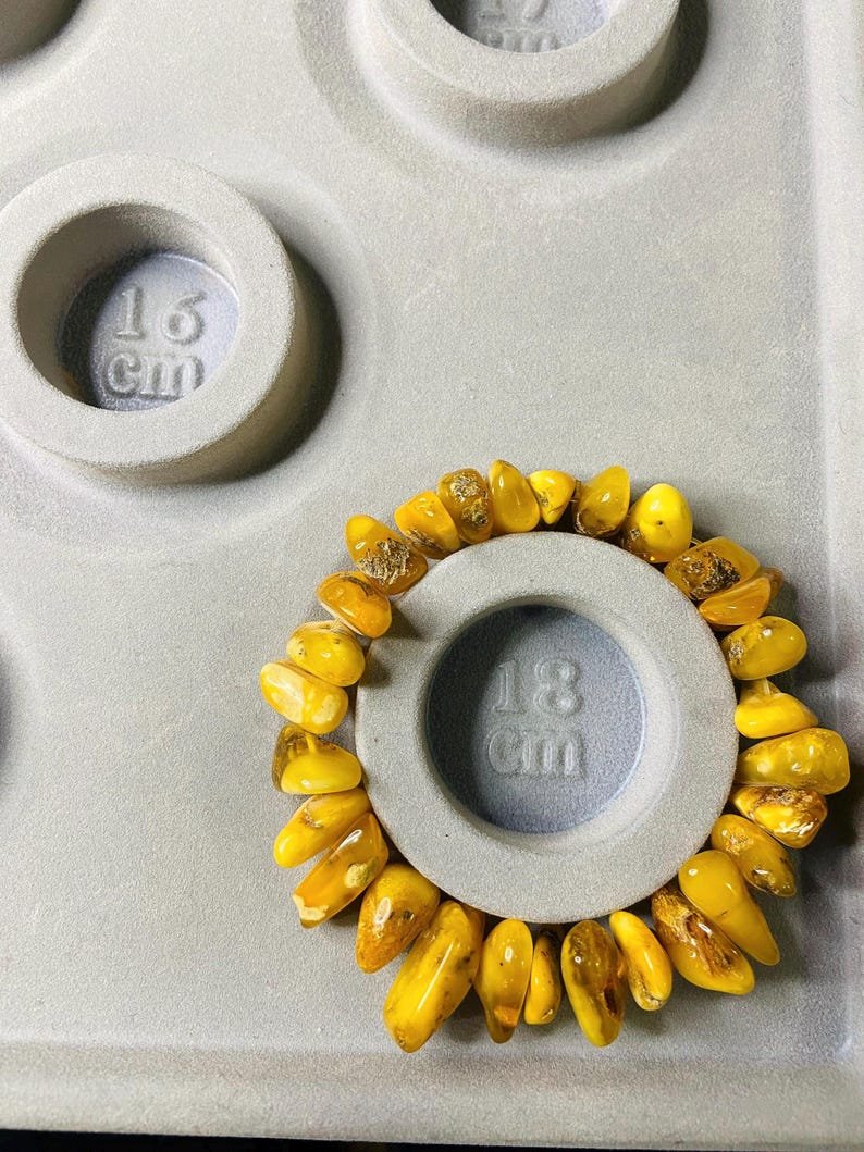 56548094-r-il-78df1a-6751582000-il_794xN.6751582000_enx9 Šķelto gabaliņu tradicionālā latviešu aproce