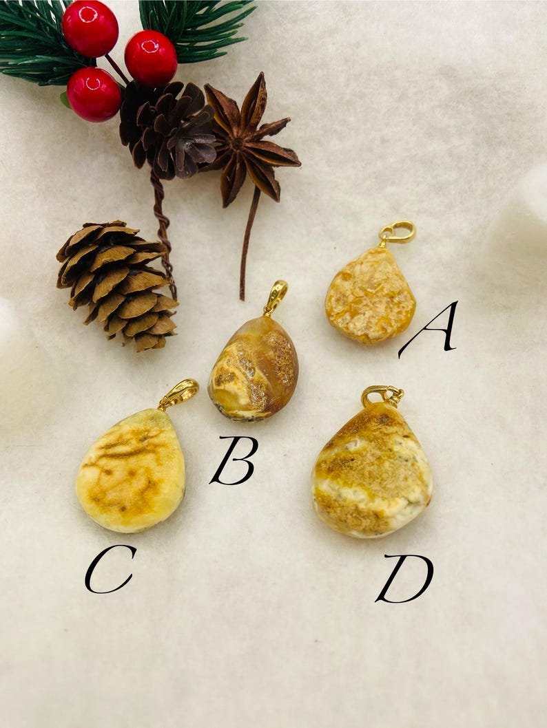 Premium klases neapstrādāti gaišās krāsas Dzintara kuloni