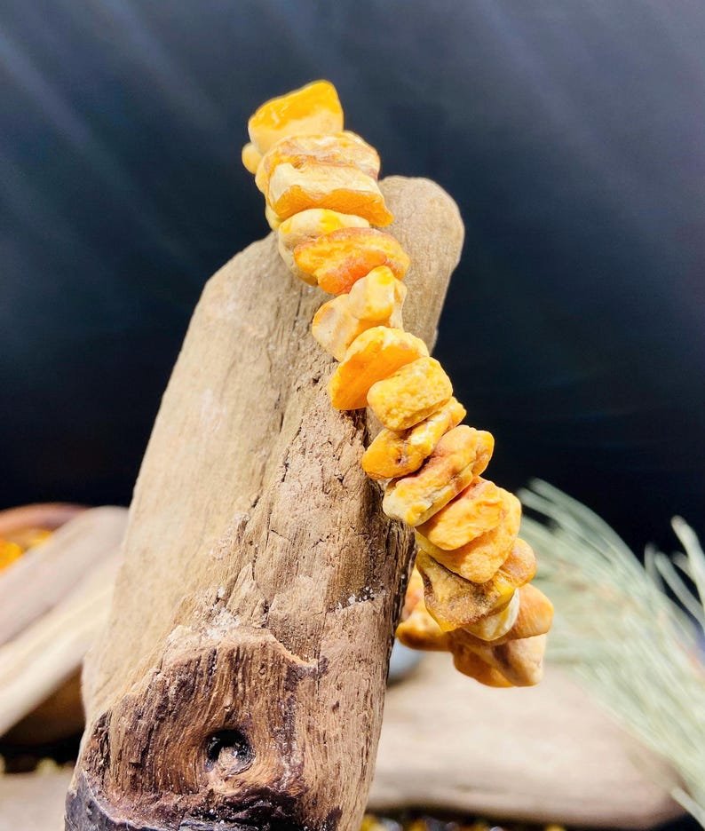 56548094-r-il-7f4512-7325398743-il_794xN.7325398743_pxd7 Unikāla Baltā Dzintara šķelto gabalu aproce