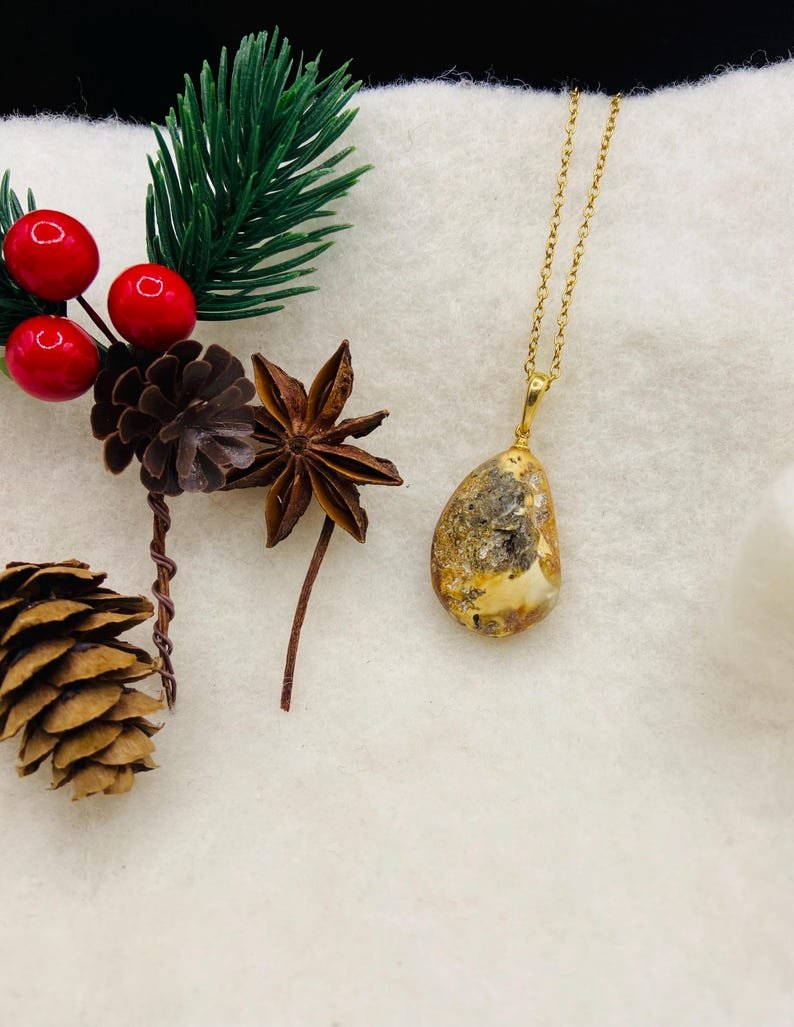 Premium klases neapstrādāti gaišās krāsas Dzintara kuloni