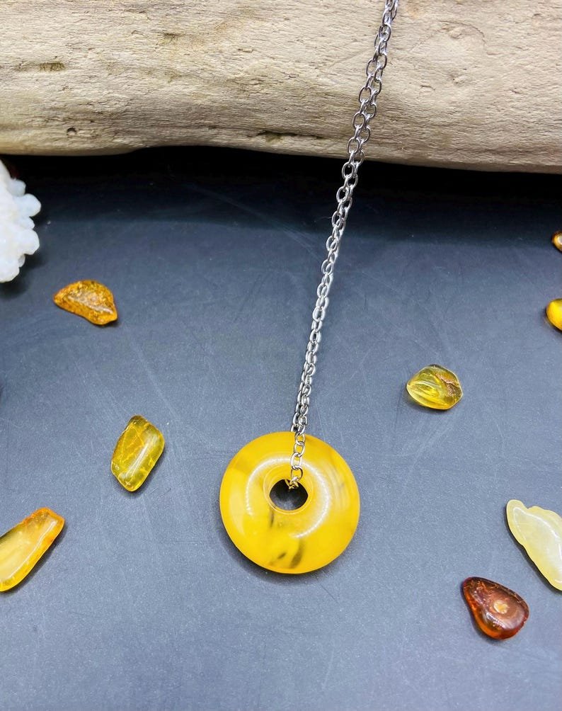 56548094-r-il-959809-6862183292-il_794xN.6862183292_h6lf Izsmalcināts Dzintara dzeltens virtulis ar nerūsējošā tērauda ķēdīti