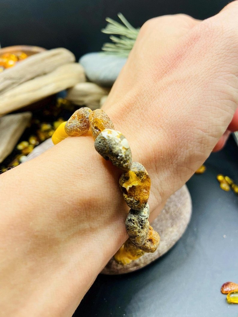 56548094-r-il-99acb0-7331092479-il_794xN.7331092479_gwtz Nepulēta Purva Dzintara aproce ar mežonīguma pieskaņu