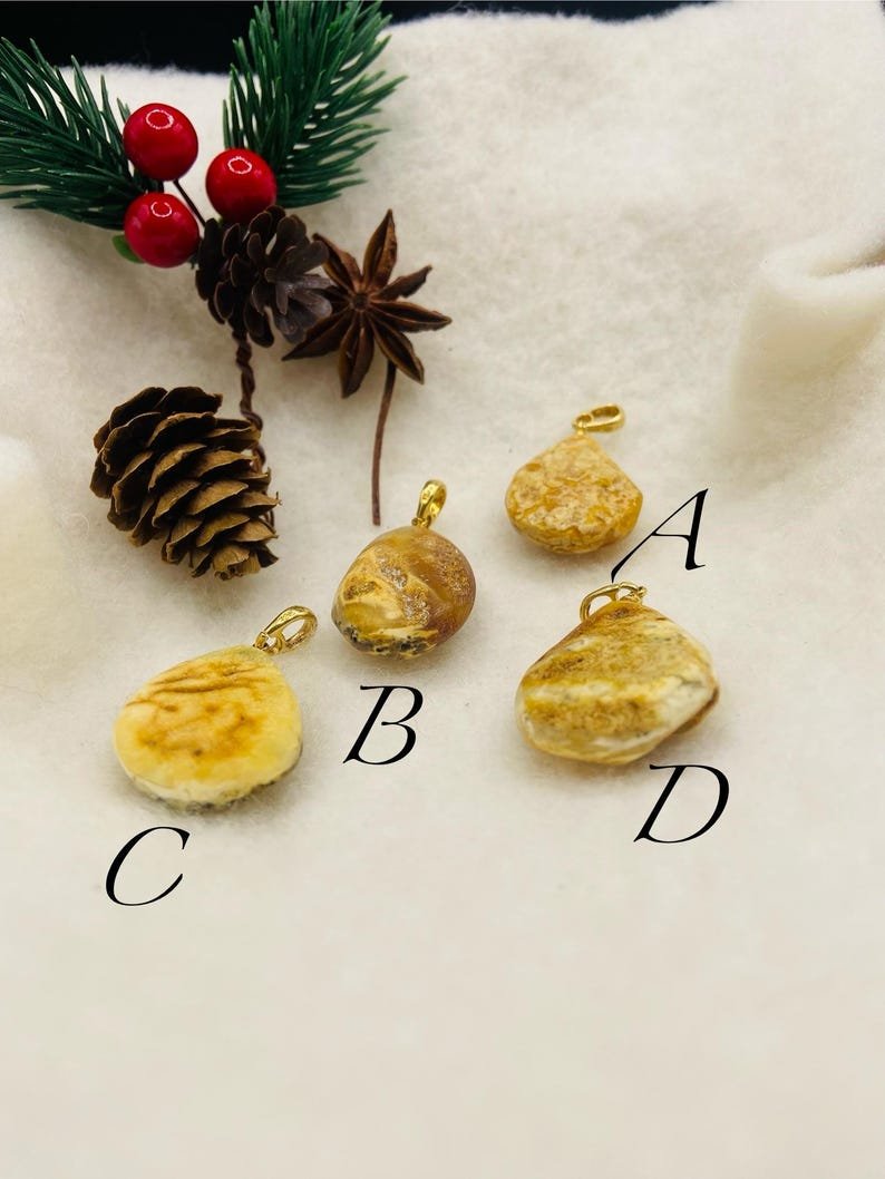 Premium klases neapstrādāti gaišās krāsas Dzintara kuloni