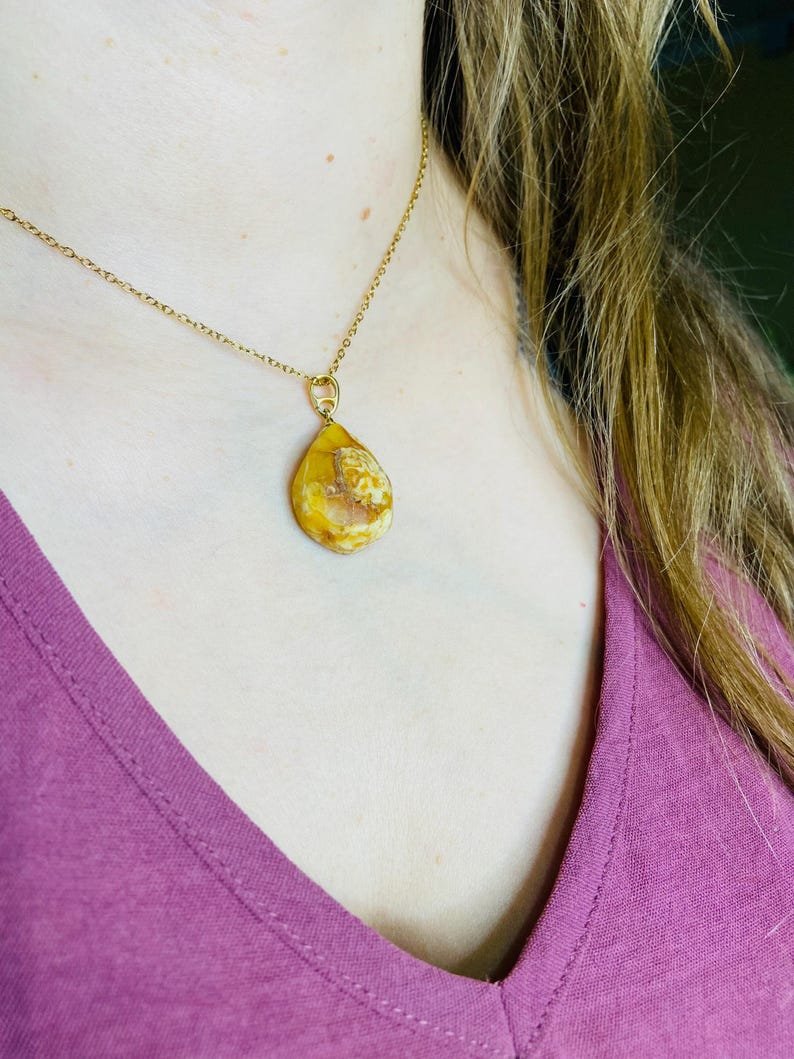 Premium klases neapstrādāti gaišās krāsas Dzintara kuloni