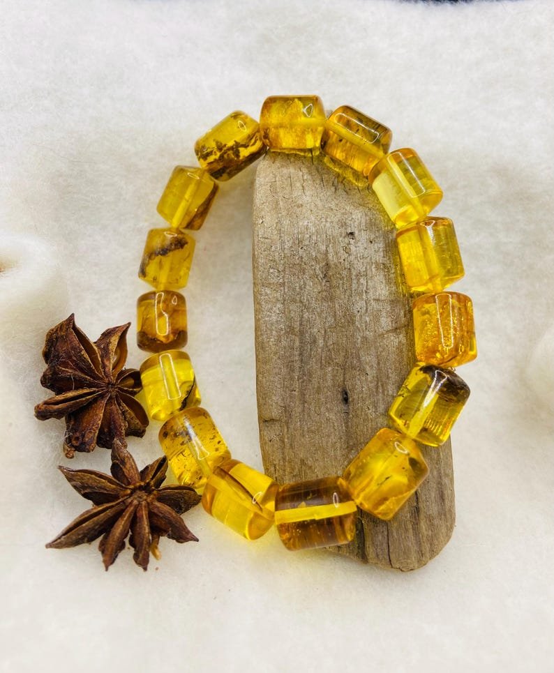 56548094-r-il-ac3ac5-7330472840-il_794xN.7330472840_7bcv Caurspīdīga citrona krāsas ekskluzīva Dzintara aproce