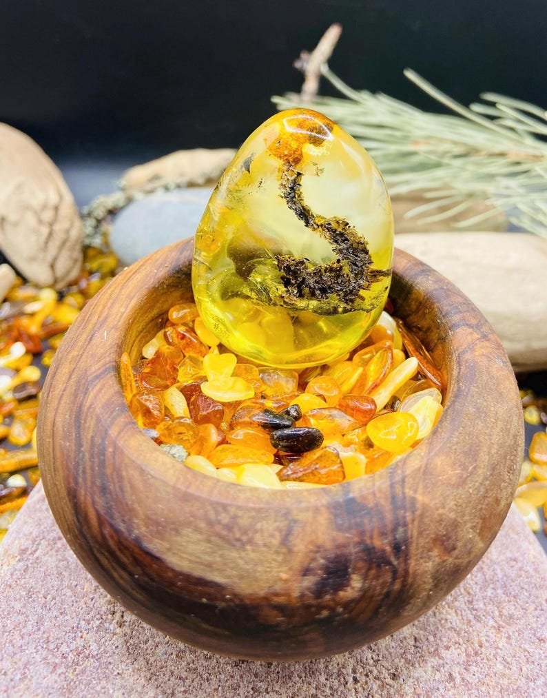 56548094-r-il-b45733-7358593979-il_794xN.7358593979_90ux Burvīgs Dzintara gabals ar unikāliem ietvērumiem, 20 grami smags