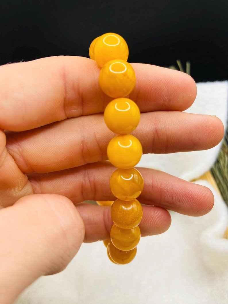 56548094-r-il-b6f7ce-7365712127-il_794xN.7365712127_rlfe Karaliskā medus krāsas Batijas Dzintara aproce, 11mm pērlītes