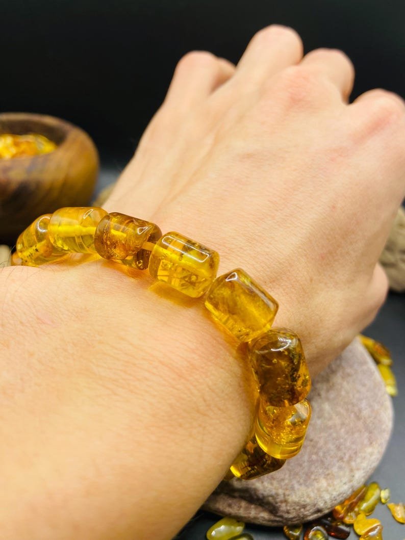 56548094-r-il-b90850-7330472614-il_794xN.7330472614_lsqc Caurspīdīga citrona krāsas ekskluzīva Dzintara aproce