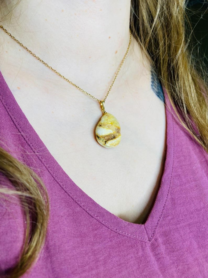 Premium klases neapstrādāti gaišās krāsas Dzintara kuloni