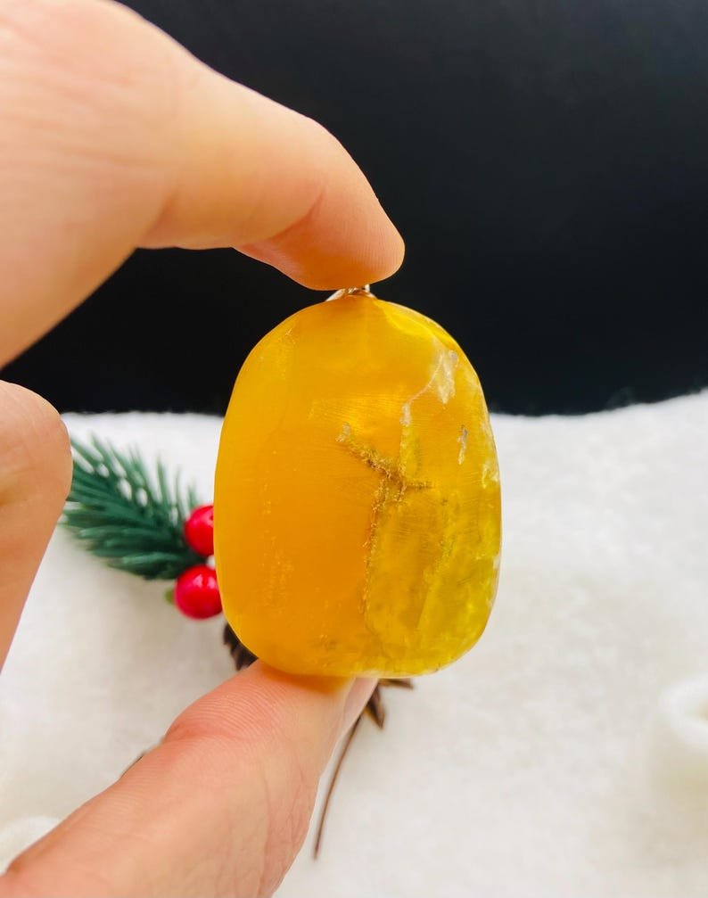 Milzīgs oranžas krāsas Dzintara kulons ar sudraba detaļu