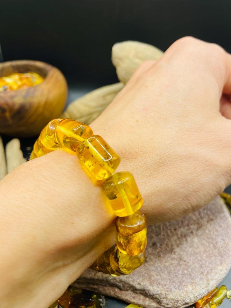 56548094-r-il-e0208e-7330472798-il_794xN.7330472798_bozy Caurspīdīga citrona krāsas ekskluzīva Dzintara aproce