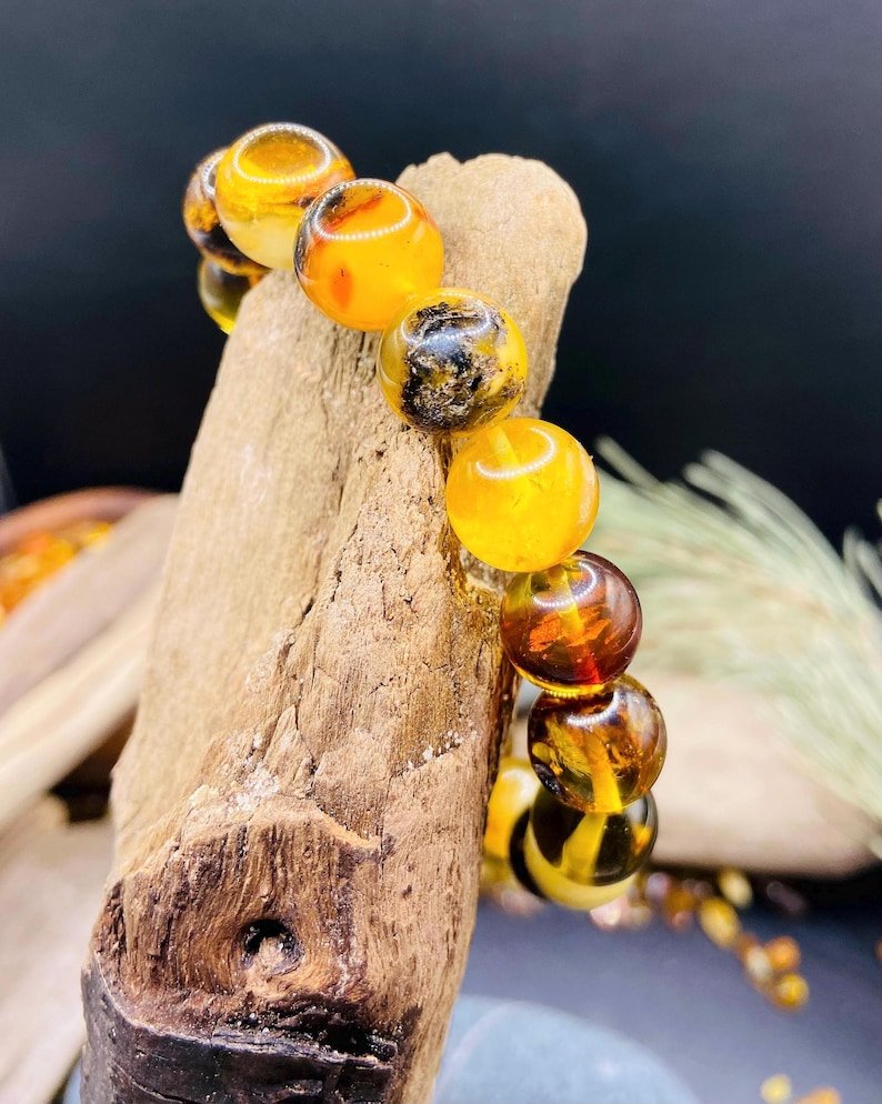 56548094-r-il-e08225-7319464981-il_794xN.7319464981_8zlq 11mm Daudzkrāsainu Dzintara pērlīšu aproce