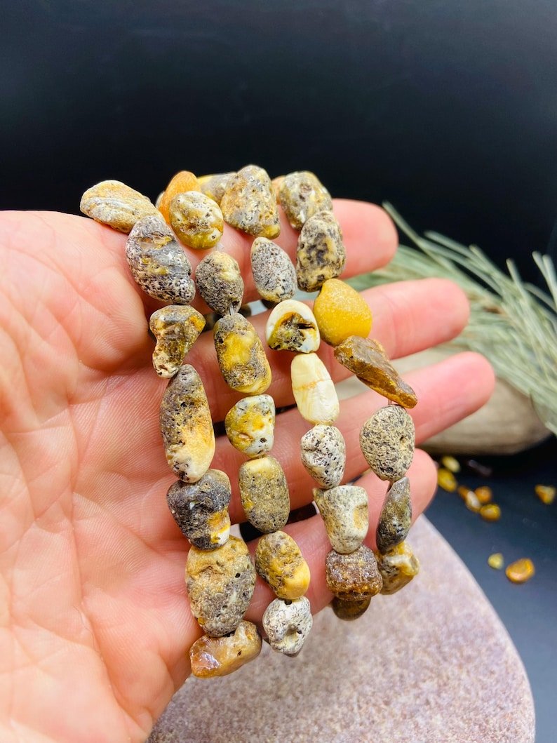 56548094-r-il-e150e6-7283140072-il_794xN.7283140072_fz8d Nepulēta Purva Dzintara aproce ar mežonīguma pieskaņu