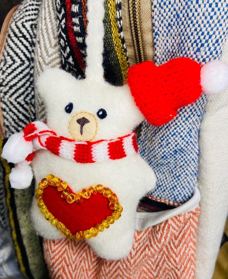 56548094-r-il-f20e6b-7395300323-il_794xN.7395300323_81cs Varenie Leduslāči viedoti no rokām izšūta filca un Dzintara pērlītēm