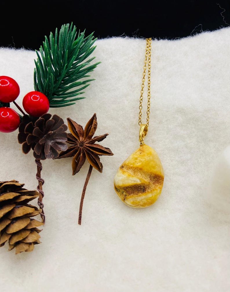 Premium klases neapstrādāti gaišās krāsas Dzintara kuloni