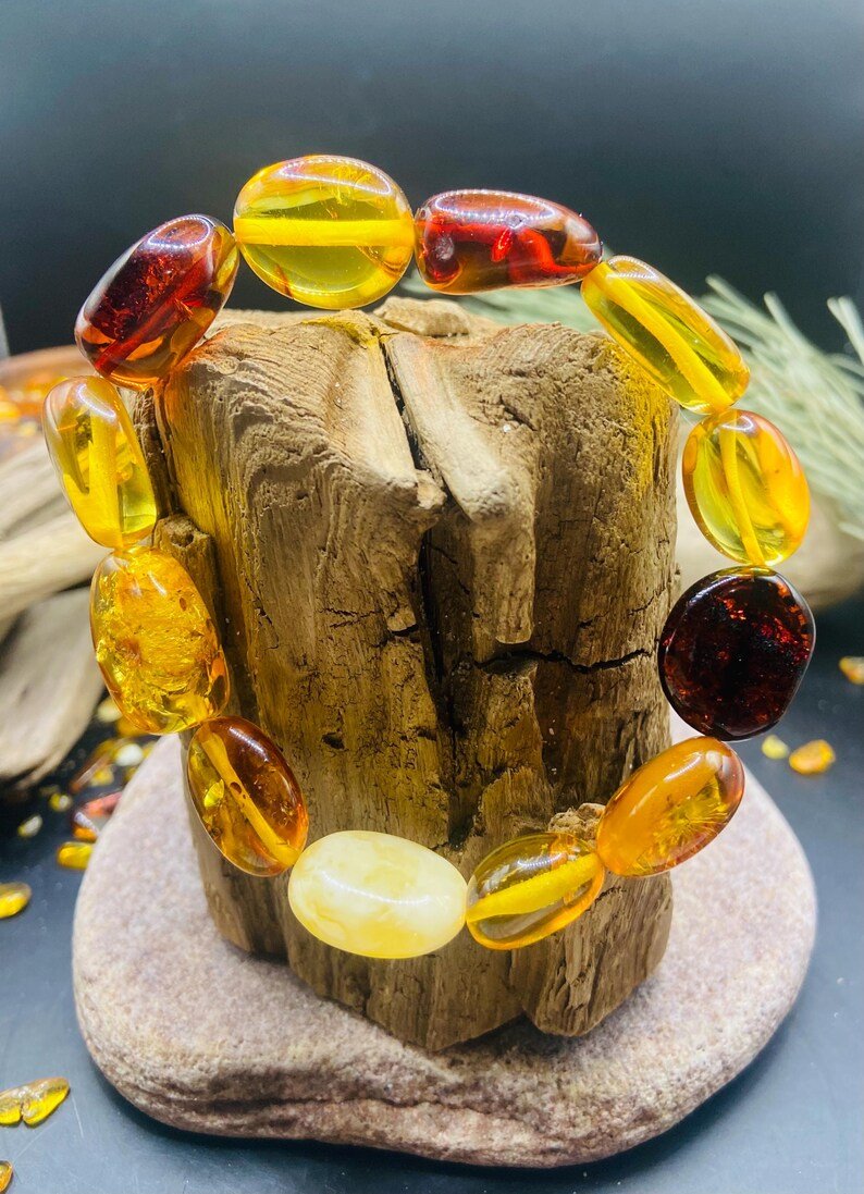 56548094-r-il-faff8c-7274114696-il_794xN.7274114696_5eys Koša un neatkārtojama Baltijas Dzintara "flatback" pērlīšu aproce