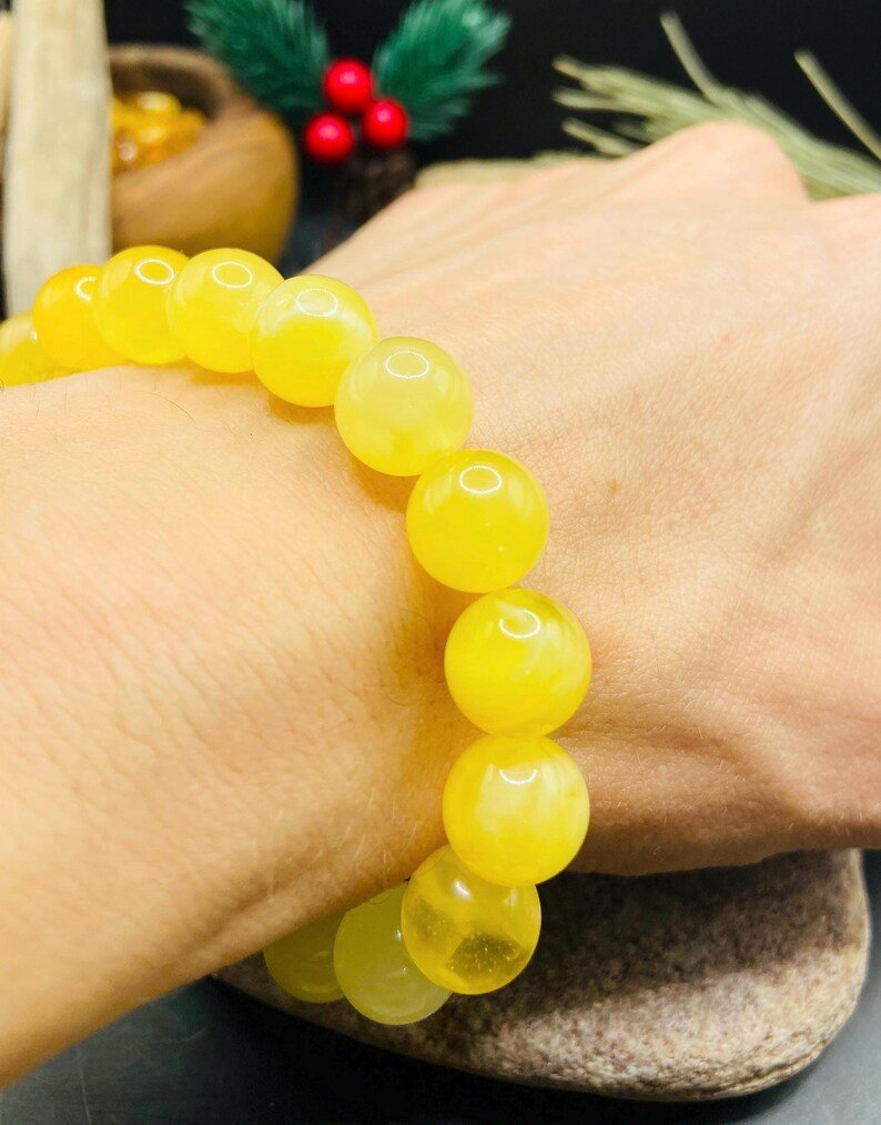 Premium klases 11mm apaļu pērlīšu Dzintara piena krāsas aporoce