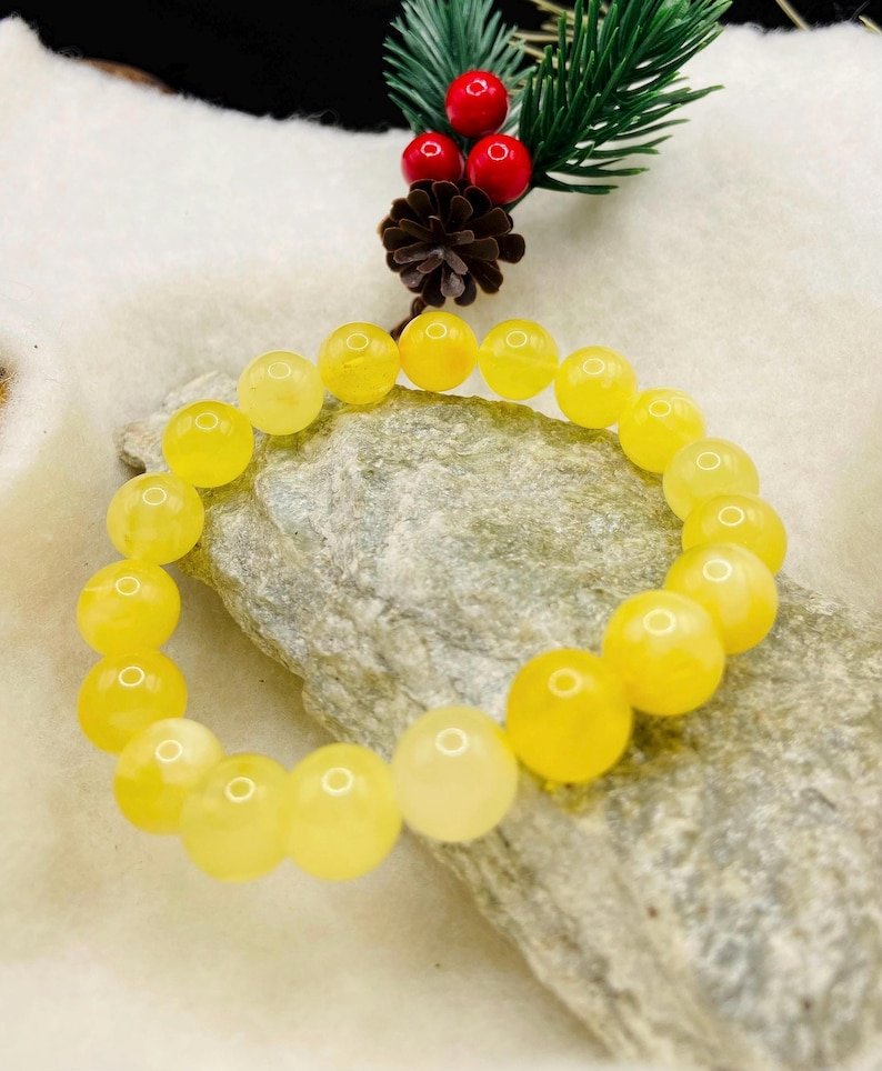 Premium klases 11mm apaļu pērlīšu Dzintara piena krāsas aporoce